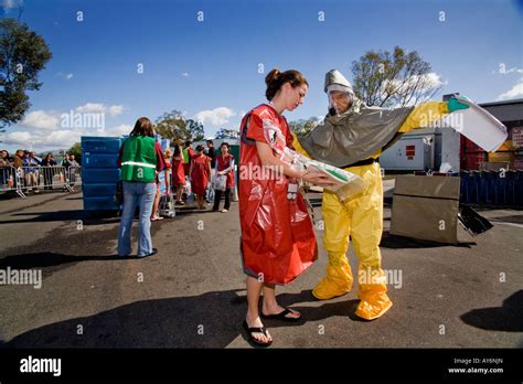 Outfitted In A Disposable Chemical Biological Protective Suit A Member