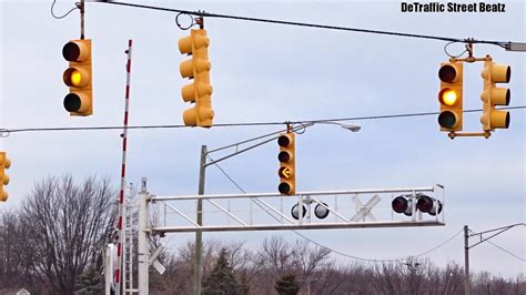 Flashing Yellow Arrow Left Turn Traffic Lights At Railroad Crossing Northline And Allen Youtube
