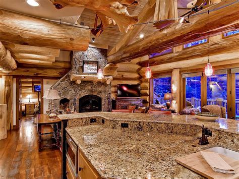 The ideal spot to take it all in is the backyard garden, a tranquil space framed by boulders and epic mountain views. Bear Creek Cabin - Breckenridge, CO | Pioneer Log Homes of BC