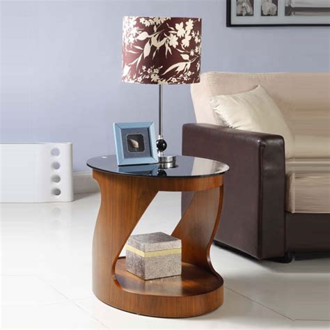Design sponge walks you step by step through the process of making yourself a simple wooden table painted with a half neon pattern, which is pretty cool in itself, but then also shows you how to make metal table legs from copper piping. Side table designs. | An Interior Design