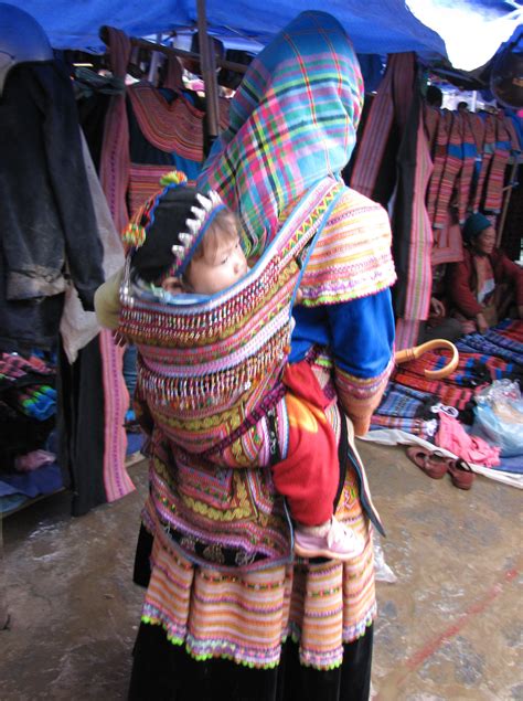 bac-ha-flowery-hmong-baby-carriers-hats-textile-trails