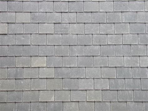 This Image Of A Slate Roof Has A Tiled Or Shingled Pattern Of