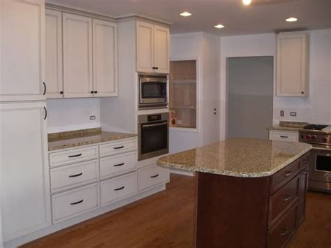 After a few minutes, scrape off the ceiling with a putty knife. 39' cab with 3" crown for 8' ceilings | 9 foot kitchen ...