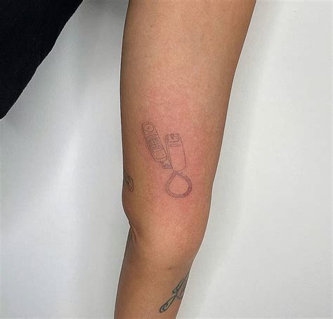 Single Needle Telephone Tattoo On The Inner Arm