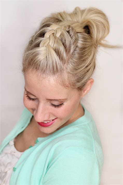 This braid, which works best with longer hair, needs a bit of texture for hold; Braided Pompadour - Twist Me Pretty