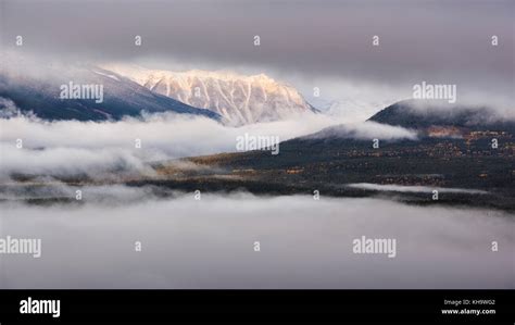 Sunrise And Morning Mist Over Columbia Valley And Snowy Mountains