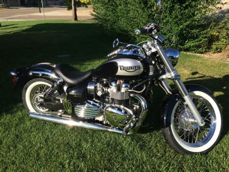 This low slung bonneville is based on the bobber type motorcycles found in the 40s of america. Custom 2003 Triumph America Bobber