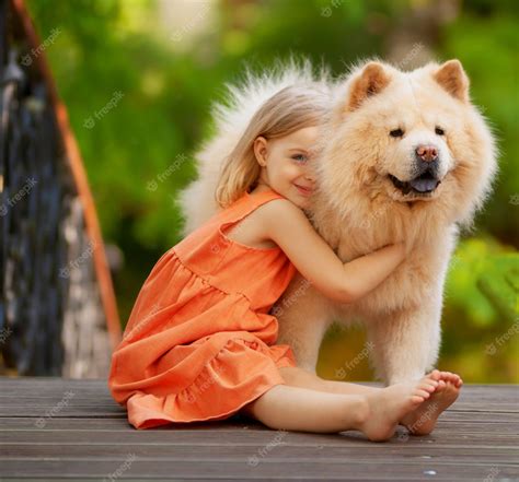 Premium Photo Beautiful Little Girl With Fluffy Red Dog