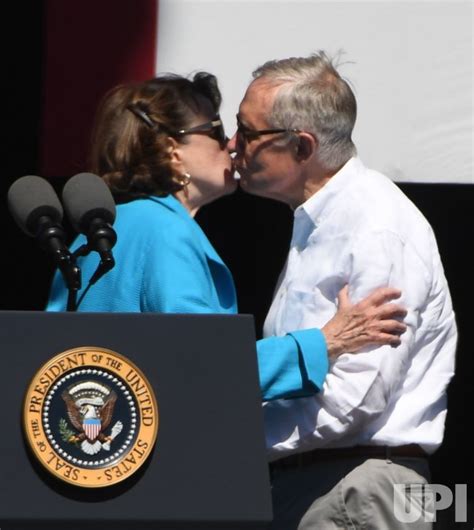 Photo Senator Dianne Feinstein Gets A Kiss From Senator Harry Reid At The 20th Annual Lake