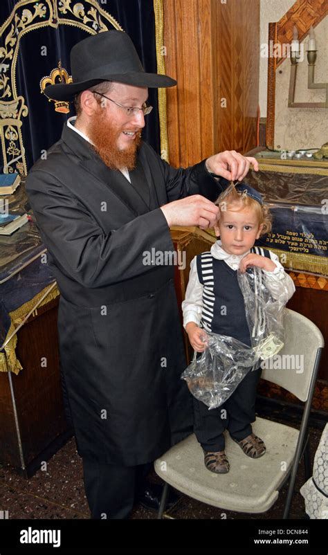 A 3 Year Old Religious Jewish Boy Getting His First Haircut A Lock