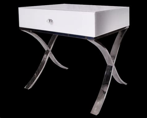 Store nighttime essentials in style and within reach with this nightstand. The Contemporary New Black or White Glass & Chrome Legs ...