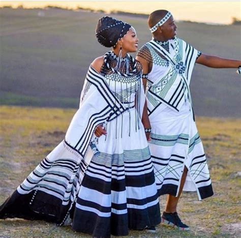 Couple In Xhosa Umbhaco Traditional Attire And Beaded Accessories