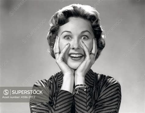 1950s 1960s Portrait Of Wacky Woman Hands On Face With Smiling Excited