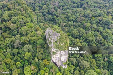 Aerial View Of Batu Punggul Is A Jungletopped Limestone Outcrop Riddled