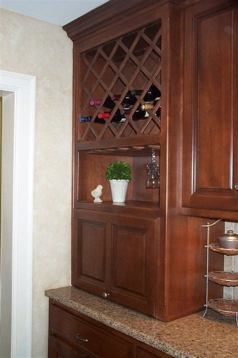 Wine racks for kitchen cabinets generally refer to wine racks installed on or within a kitchen cabinet. Related image | Kitchen cabinet wine rack, Wine cabinets ...