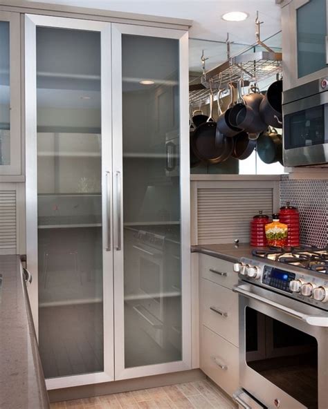 We have found some very alluring pantries designs for the modern kitchens today and we decided to share them with you, so feel free to check out 10 super modern kitchen pantry cabinets list, to get some ideas when choosing a pantry of your own. Glass kitchen cabinet doors - modern cabinets design ideas