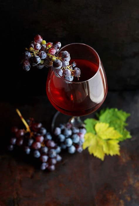 Red Grapes On Clear Glass Wine Image Free Photo