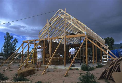 Straw bale houses use straw bales as insulation or as the structural building block of the home. Pictures of Straw bale home construction | Cob house plans ...