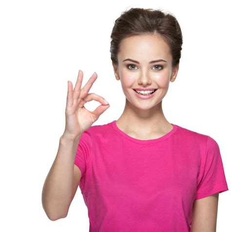 Free Photo Portrait Of A Beautiful Young Happy Woman With Ok Gesture