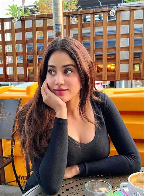 janhvi kapoor looks stunning in a simple short black dress flaunting her fine curves top 10 of