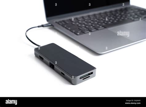 Sleek And Modern Usb Hub With Multiple Ports Connected To A Laptop