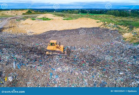 Aerial View On Bulldozer Working On The Landfill Stock Image Image