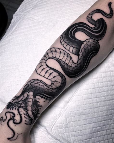 The battle royale and battleship tattoos with what are they. Snake tattoo | Julieta Garcia in 2020 | Snake tattoo ...