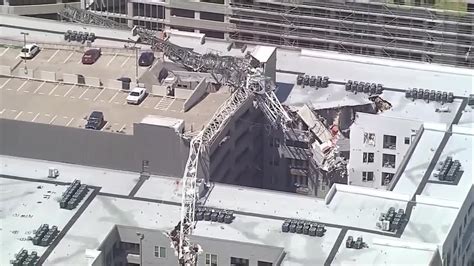 1 Dead 6 Injured After Crane Crashes Into Dallas Apartment Building