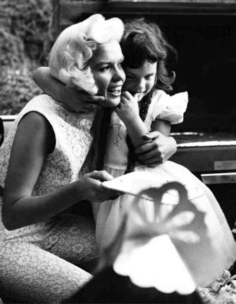 jayne mansfield and her daughter jayne marie on her sixth birthday on november 8 1956