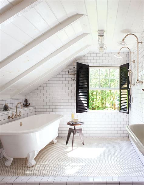 Its a good size for an attic at appox 5x6 meters and 3 meters tall at the apex. Love the subway tiles with dark grout, black shutters, clawfoot bathtub and shiplap walls ...
