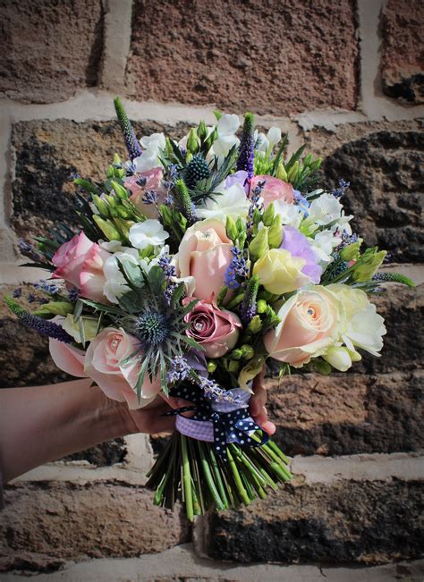 Hand Tied Bouquet Of Thistle Sweet Avalanche Roses Memory Lane Roses