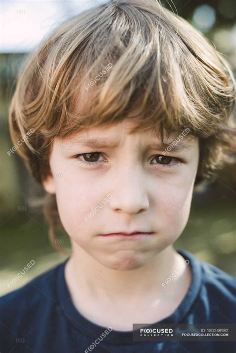 Portrait Of Little Boy Pouting Mouth — Outdoor Face Stock Photo