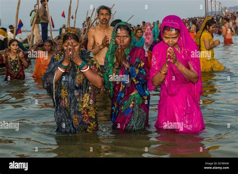 Women Taking A Bath In The Sangam The Confluence Of The Rivers Ganges
