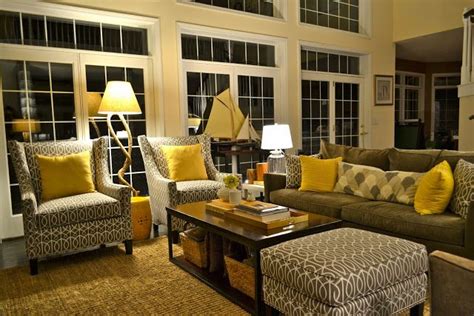 Yellow color reminds you of sunshine, daffodils, songbirds and gold. Grey and yellow living room- LOVE this. This is what I ...