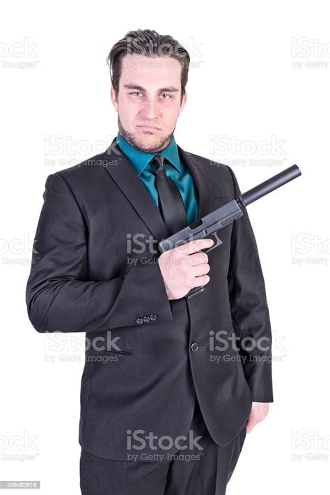 Handsome Man Holding Gun Stock Photo Download Image Now Adult
