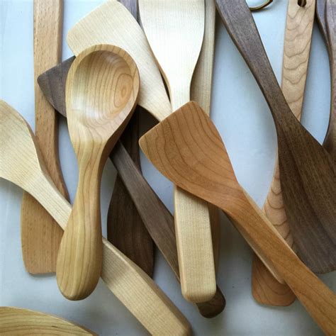Using a fine sandpaper, sand off the burned area of the spoon or utensil. Carved Wooden Spoons - Maine Made