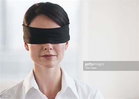 Businesswoman Wearing Blindfold Photo Getty Images