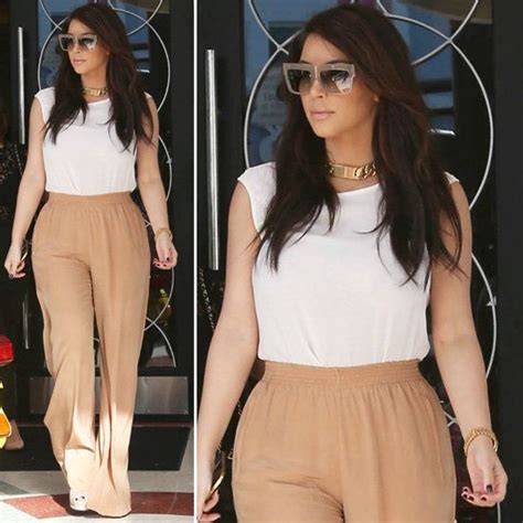 Kim Kardashian Goes Neutral And Bold In Tan Wide Leg Pants Wide Leg