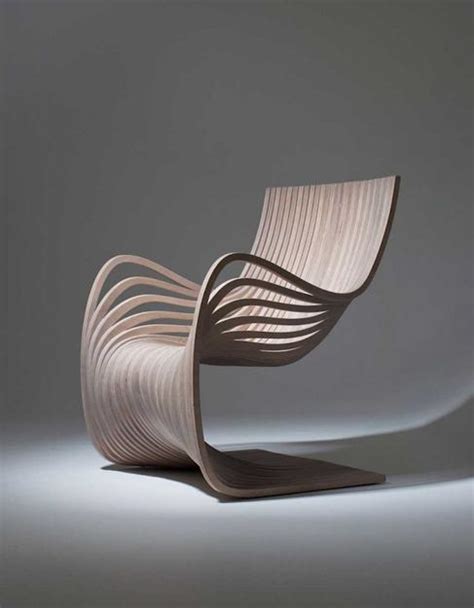 Wooden Chair Showing Movement And Material Conscious Design