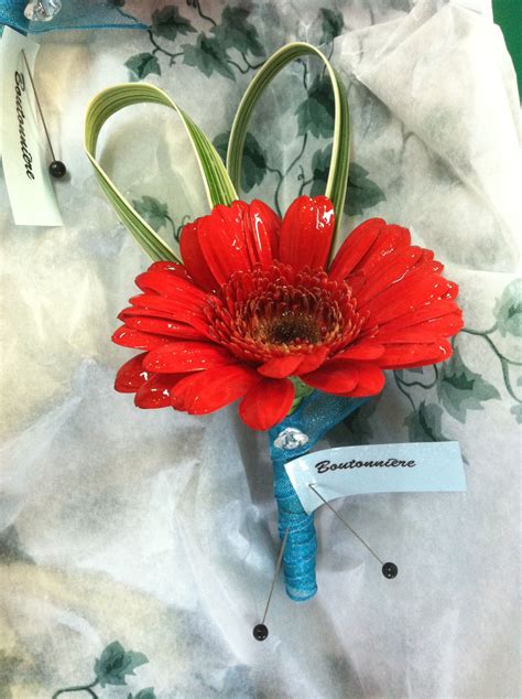 Red Gerber Daisy With Aquamarine Wrap Diamond Accent Lapel Flower