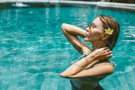 Woman Relaxing In Swimming Pool Stock Image Colourbox