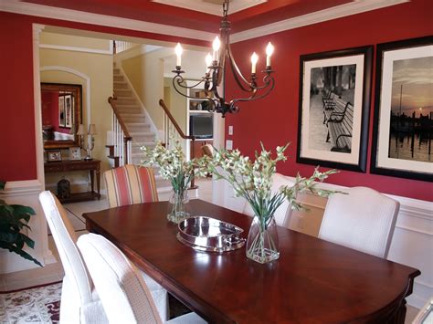 Mediterranean red dining room with custom tile baseboards and rug, jacobean vintage dark wood rectangular dining set, religious figurine as a centerpiece with glass and metal candelabras, the walls were treated with venetian plaster and then hand soap waxed to get that lived in texture, various wall, ceiling designs to add exotism and frame the. 60 Red Room Design Ideas (All Rooms - Photo Gallery)