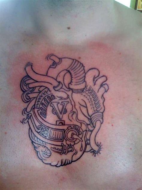 28 Mechanical Heart Tattoos