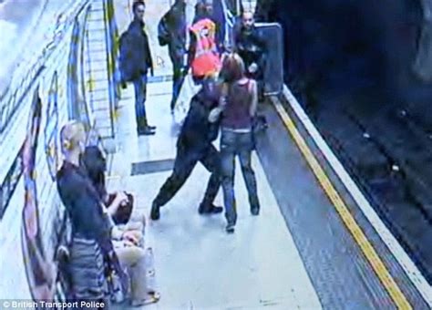 The Moment Crazed Commuter Shoves 23 Year Old Woman On To Tube Tracks Daily Mail Online