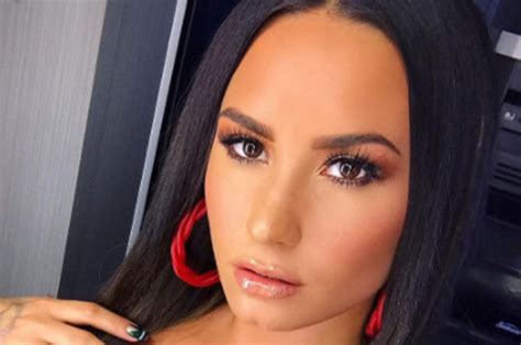 Demi Lovato Lyrics Have Nothing On Singers Boob Spilling Sexy Dress