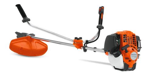 An Orange And Black Snow Blower On A White Background