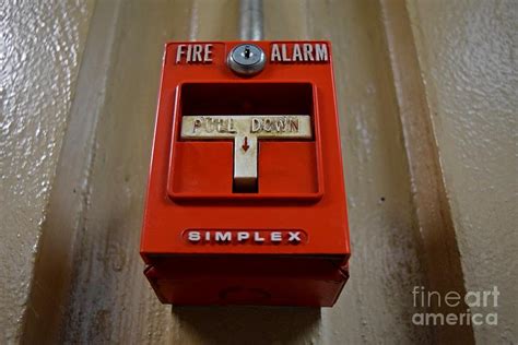 Breaking a breakrod in a simplex pull station. Simplex fire alarm pull station at 223 Walnut Street ...