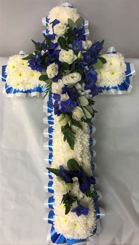 Cross Blue And White Funeral Flower Arrangements