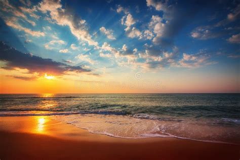 Golden Sunrise Over The Sea And Sand Beach Scenery Morning Sky Stock