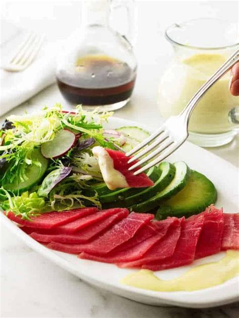 Thin Slices Of Yellowfin Tuna Adorns This Vibrant Ahi Tuna Sashimi